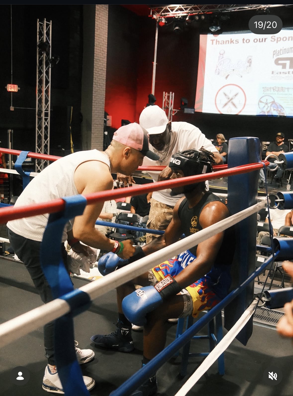 Coaches working the corner between rounds