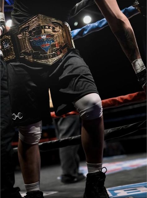 Championship belt in the ring
